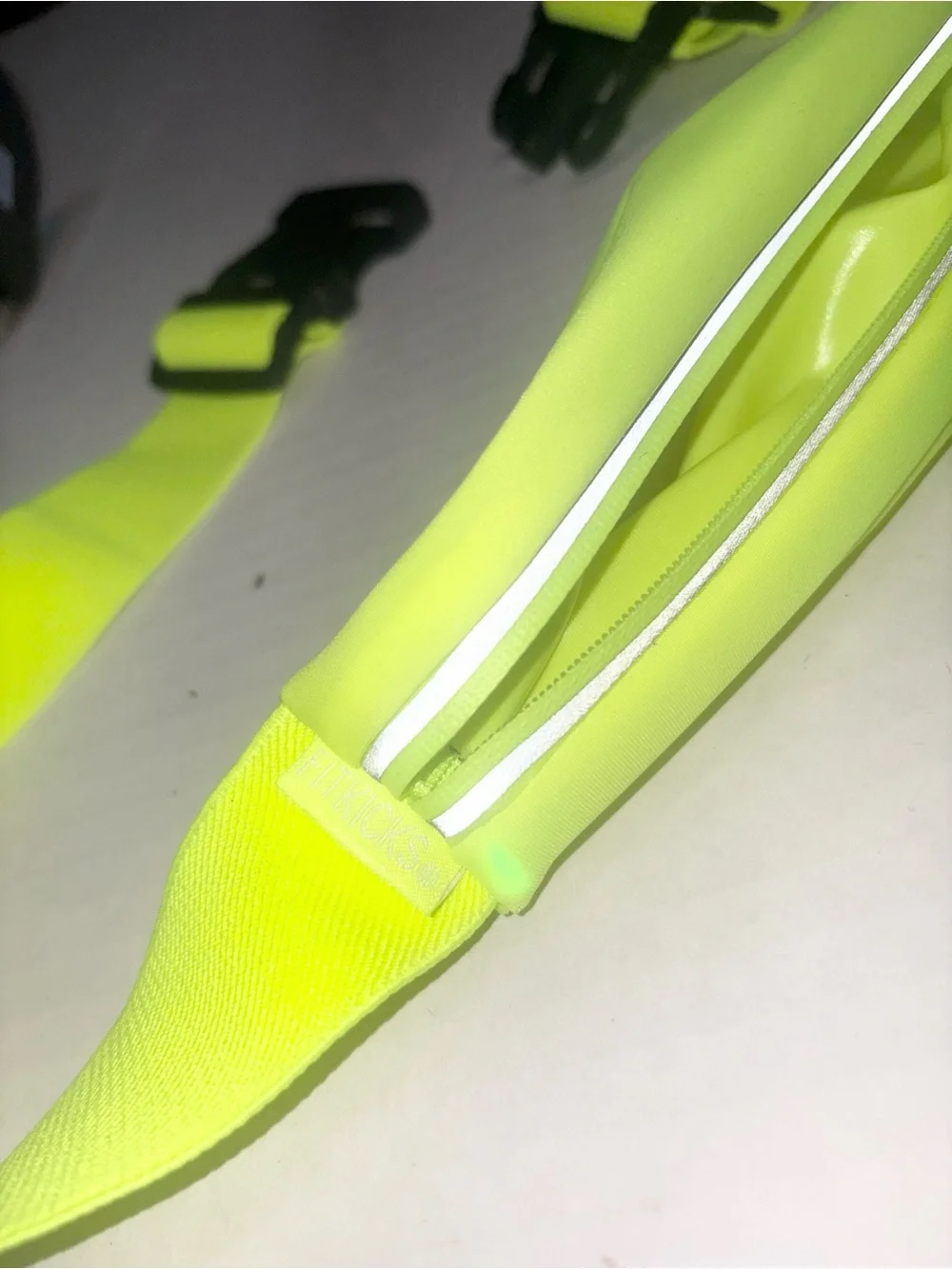 FitKicks FitZip neon illuminating waist pack LED safety lights night running